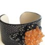 Stingray Skin Cuff (Genuine Polished Stingray Skin, Citrine, Microbeads, Swarovski crystals, Swarovski Ceralun Epoxy Clay) Throughout history and in many cultures citrine was known as the merchant's stone. In feng shui, citrine is considered to attract wealth and abundance.  SOLD